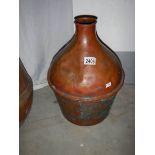 A copper water carrier.
