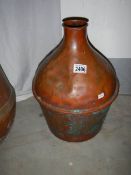 A copper water carrier.