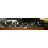 A mixed lot of silver plate milk jugs.