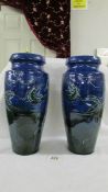 A pair of C H Branham Barum, Barnstaple 31 cm blue vases,