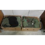 2 boxes of military and camouflage clothing.