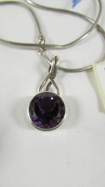 An amethyst set pendant in silver with attached snake link silver chain. - Image 3 of 4