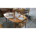A good quality teak dining table with 6 dining chairs.