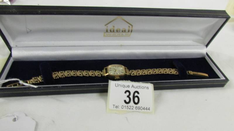 A 9ct gold ladies Avia wrist watch on 9ct gold bracelet, total weight 13.6 grams.