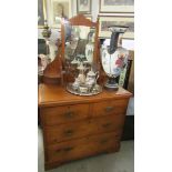 A satin walnut dressing table.