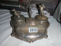 An unusual inkstand surmounted golfer and bird (missing bottles)