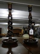 A pair of oak barley twist candlesticks. ****Condition report**** Circa 1930's.