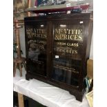 A 2 door glazed display cabinet with McVitie & Price Biscuits advertising.