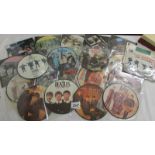 22 Beatles 45 rpm picture discs and 3 others.