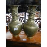 A pair of Chinese bronze dragon vases. 35 cm tall.