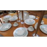 A 36 piece Royal Doulton Hampton Court pattern dinner set.