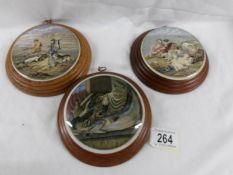 3 framed Pratt ware pot lids Including 'The Sportsman' and 'Peace'.