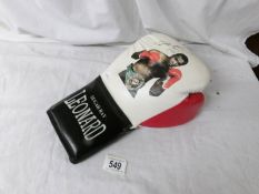 A signed boxing glove, Sugar Ray Leonard.