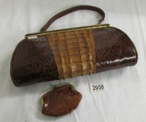 A good quality handbag with a purse (purse a/f).