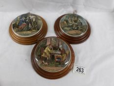 3 framed and glazed Pratt ware pot lids - 'Persuasion', 'A Fix', 'A Pair'.