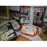 3 albums of stamps and a quantity of first day covers.