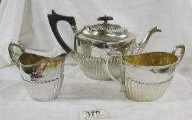 A three piece silver plate tea set marked S B & M, 2616.