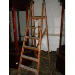 A wooden step ladder.