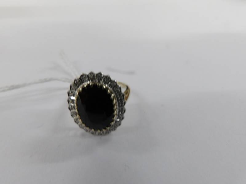 A diamond and sapphire oval cluster ring in 9ct white yellow gold, size L. - Image 2 of 2