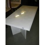 A white marble coffee table. ****Condition report**** Top 101cm x 51cm. Height 46.