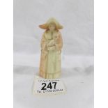 An early Royal Worcester candle snuffer in the form of a nun.