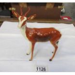 A Beswick antelope.