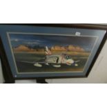 A framed and glazed print of a Hurricane. 94 x 77 cm.