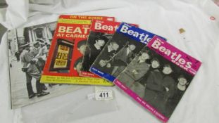 Three 1960's Beatles Monthly magazines together with The Beatles at Carnegie Hall, New York.