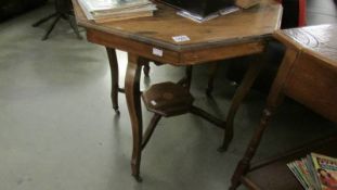 A mahogany occasional table.