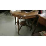 A mahogany occasional table.