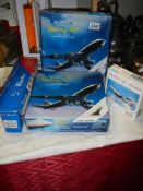 2 boxed Boeing 474 Air India airplane and one other.