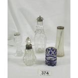 A silver top sugar sifter, 2 small vases with silver rims,