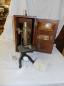 A good cased brass microscope, 'Nivoc', W & J George Ltd.