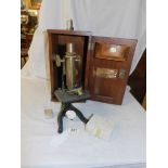 A good cased brass microscope, 'Nivoc', W & J George Ltd.