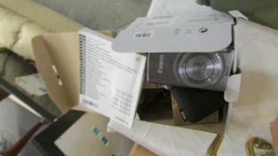 A Canon Ixus 165 digital camera.