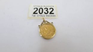 A 1918 gold sovereign in a 9ct gold pendant mount.