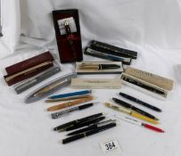 A good lot of vintage ball point pens, a Parker pen set, a Platinum fountain pen, pen boxes etc.