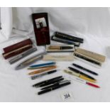 A good lot of vintage ball point pens, a Parker pen set, a Platinum fountain pen, pen boxes etc.