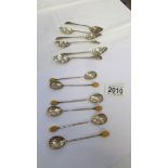 2 sets of 6 silver teaspoons.
