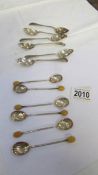 2 sets of 6 silver teaspoons.