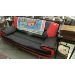 A black and red retro settee.