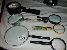 6 assorted magnifying glasses including 2 with unusual handles.
