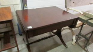 A mahogany drop side table.