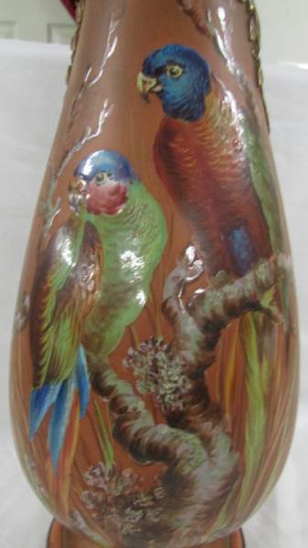 A 44 cm tall brown vase painted with parrots on and branch with other applied decoration, - Image 2 of 4