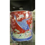 A large Chinese plant pot hand painted with storks.