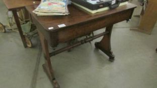 A mahogany side table.