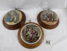 3 framed Pratt ware pot lids - 'Uncle Toby', 'Dr Johnson' and one other.