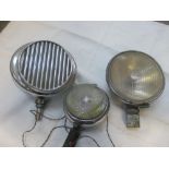 Three 1940s/1950s chrome classic car spot lights including Lucas 700,