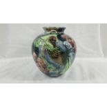 A beautiful antique Trojan 15cm high posy vase painted with flowers and a bird, signed R Dean.