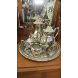 A 4 piece silver plate tea set on tray.